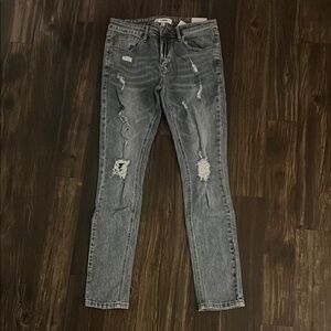 Distressed Blue Jeans